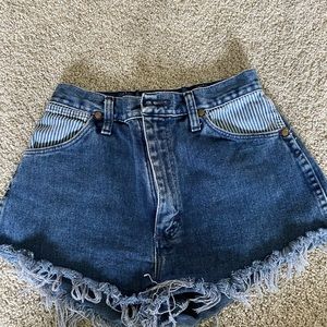 Wrangler blue shorts.